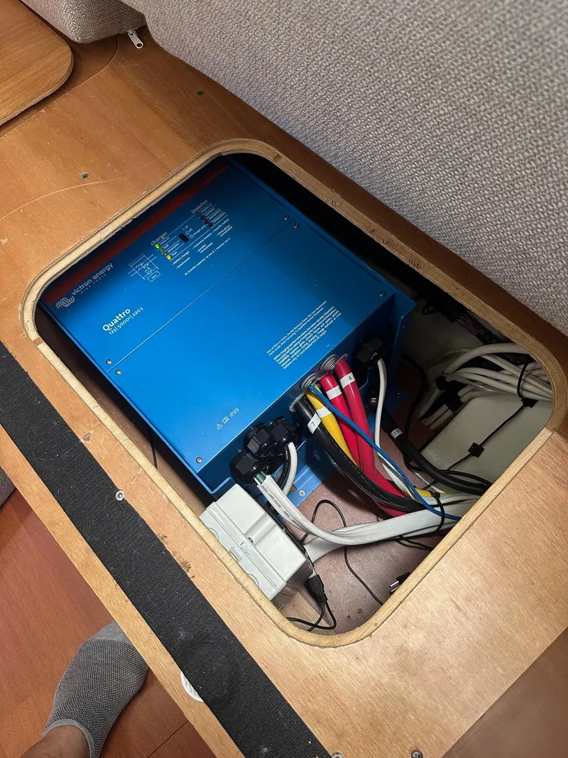 Slide: The Image of Electrical system inside 2014 Beneteau Oceanis 50 yacht, featuring wiring and components. - 51