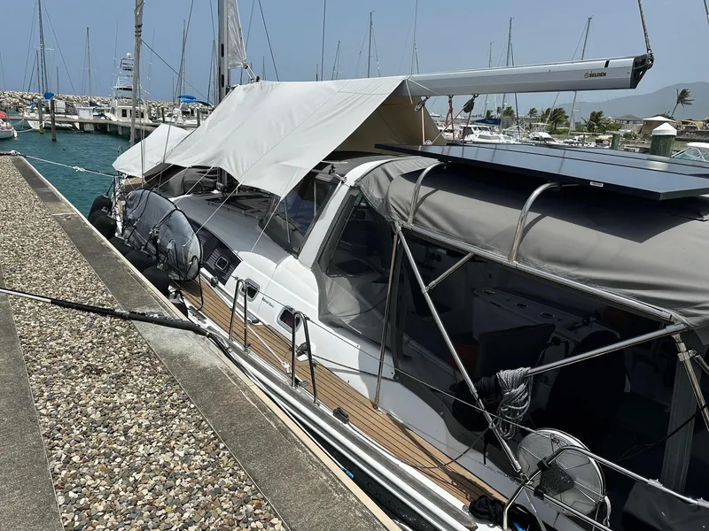 Slide: The Image of 2014 Beneteau Oceanis 50 yacht docked at marina with protective covers. - 6