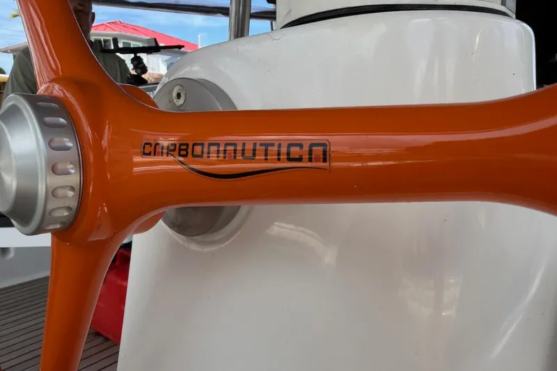 Slide: The Image of Orange Carbonautica wheel on 2014 Beneteau Oceanis 50 sailboat. - 62