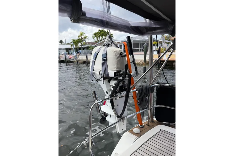 Slide: The Image of 2014 Beneteau Oceanis 50 yacht with lifebuoy and equipment at dockside. - 63