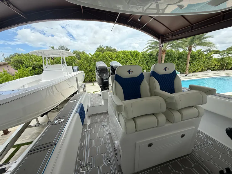 Slide: The Image of 2024 Carrera Powerboats 320CC Classic interior with luxurious seating and modern design. - 13