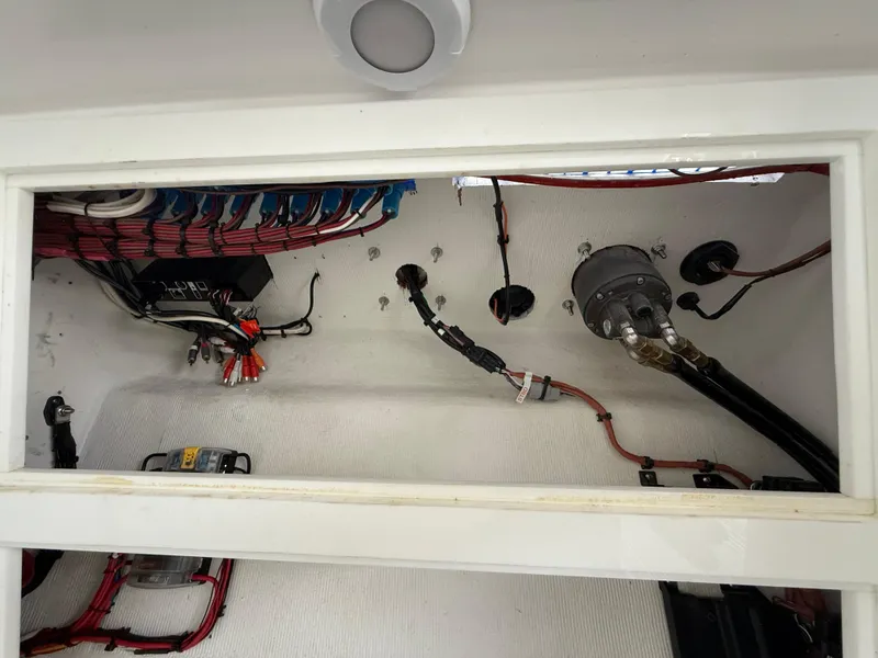 Slide: The Image of Interior wiring of 2024 Carrera Powerboats 320CC Classic, showcasing electrical components and connections. - 23