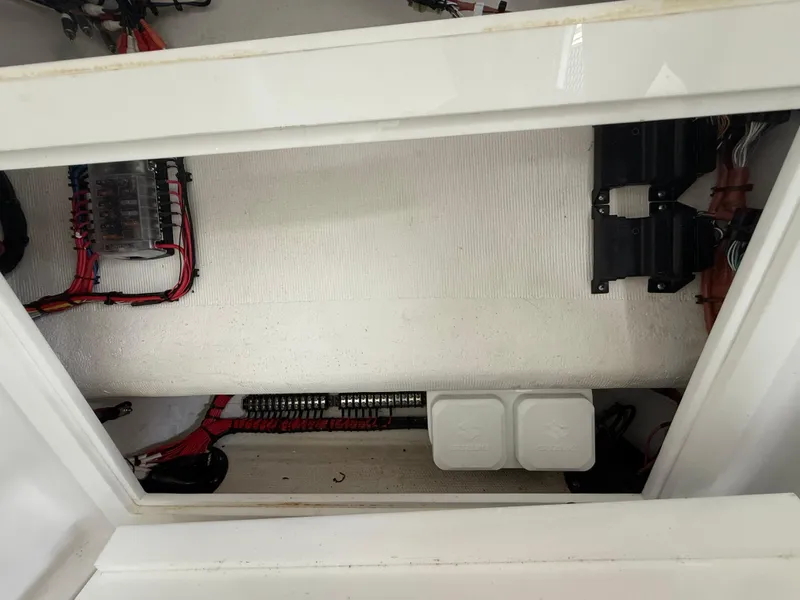 Slide: The Image of Electrical compartment of 2024 Carrera Powerboats 320CC Classic, showcasing wiring and components. - 24