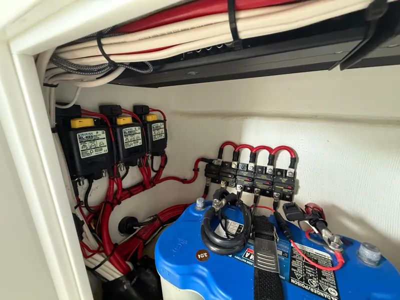 Slide: The Image of Electrical system of 2024 Carrera Powerboats 320CC Classic, featuring battery and wiring. - 27