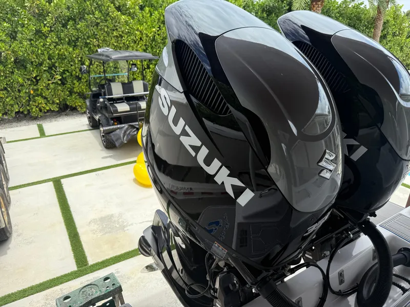 Slide: The Image of Twin Suzuki outboard engines on a 2024 Carrera Powerboats 320CC Classic. - 37