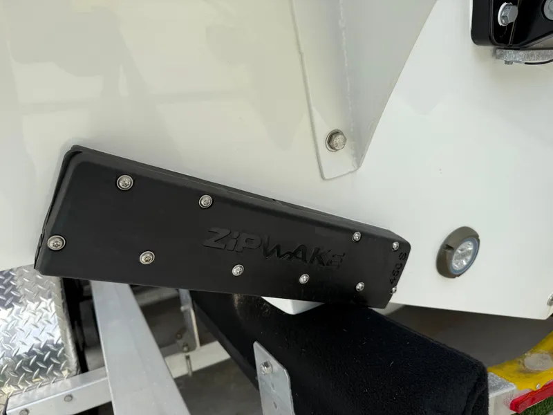 Slide: The Image of 2024 Carrera Powerboats 320CC Classic with Zipwake trim system detail. - 38