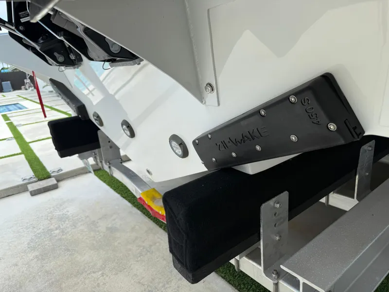 Slide: The Image of 2024 Carrera Powerboats 320CC Classic with Zipwake system on display. - 41