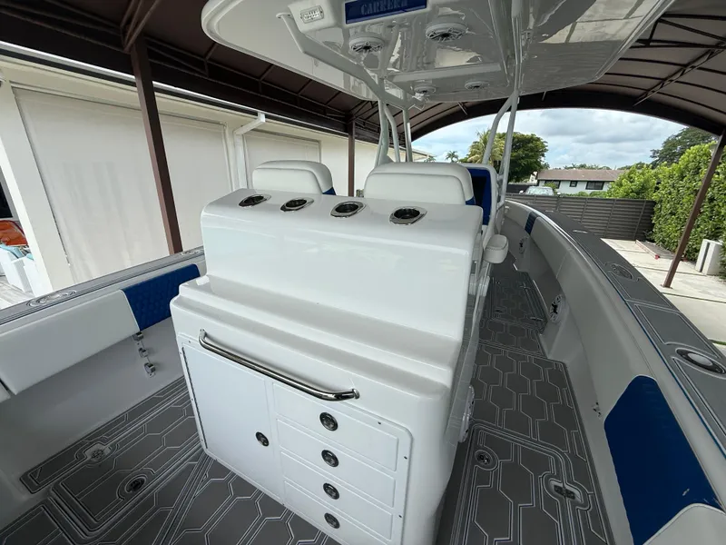 Slide: The Image of 2024 Carrera Powerboats 320CC Classic interior with modern seating and sleek design. - 6