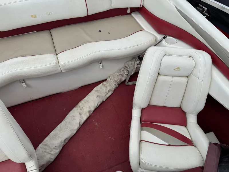 Slide: The Image of 1998 Larson 195 boat capacity and safety labels, including U.S. Coast Guard compliance. - 9