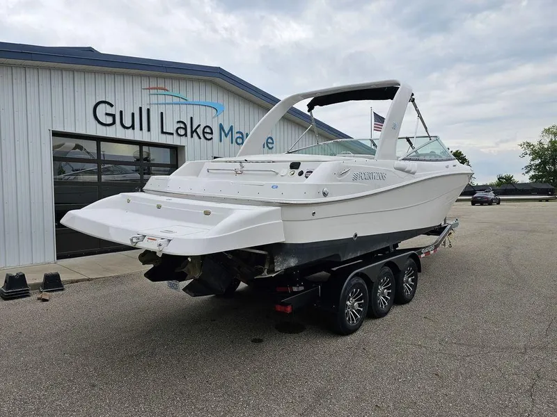Slide: The Image of 2006 Four Winns 290 Horizon boat on trailer at Gull Lake Marine dealership. - 2