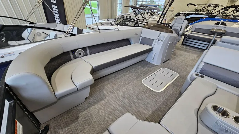 Slide: The Image of 2020 Bennington L 25 Swingback pontoon boat interior with luxurious seating and modern design. - 16