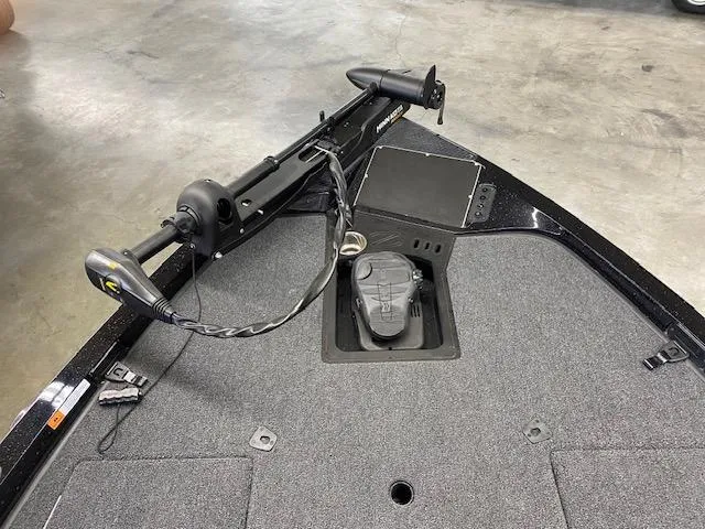 Slide: The Image of 2023 Ranger Z518 boat deck with trolling motor and foot pedal controls. - 5