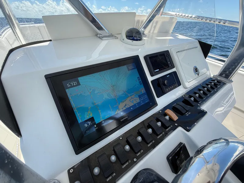 Slide: The Image of Control panel of 2021 Avance 33 Cabriolet boat with navigation display. - 10