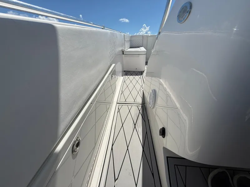 Slide: The Image of 2021 Avance 33 Cabriolet boat deck with sleek design and modern features. - 11