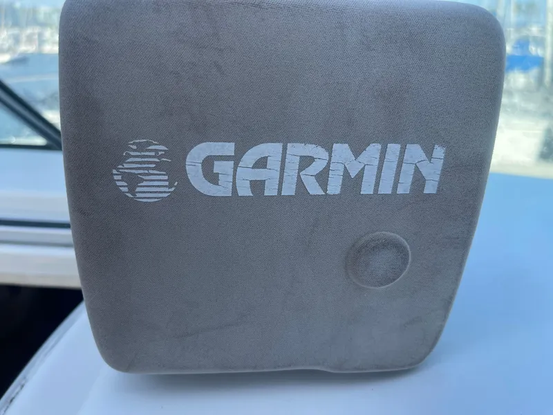 Slide: The Image of Gray Garmin device cover on a 2003 Larson 270 boat. - 27