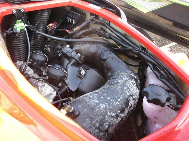 Slide: The Image of Engine compartment of a 2004 Sea-Doo XP® DI DI jet ski. - 11