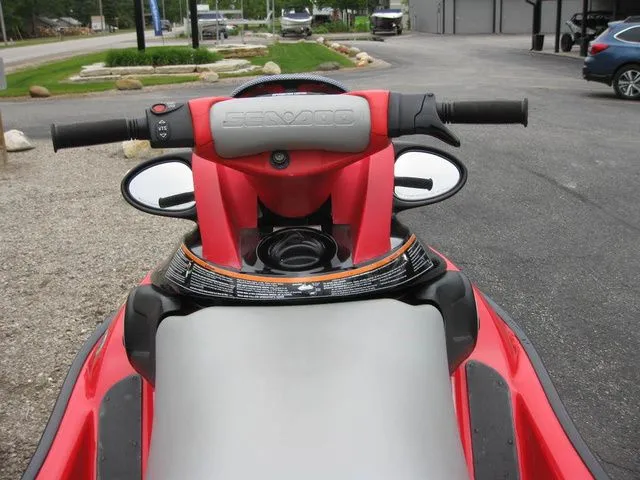 Slide: The Image of 2004 Sea-Doo XP® DI DI jet ski, red design, close-up of handlebars. - 4