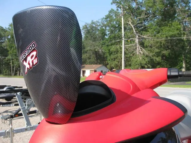 Slide: The Image of 2004 Sea-Doo XP DI DI in vibrant red, close-up view. - 8