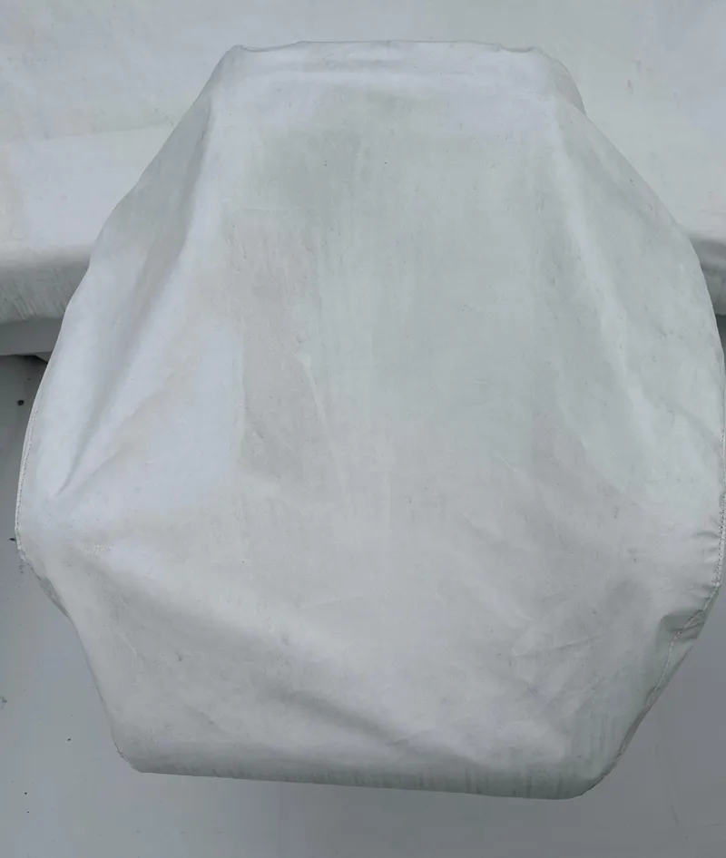 Slide: The Image of White cover on Carver 374 Voyager boat seat, 2000 model. - 23