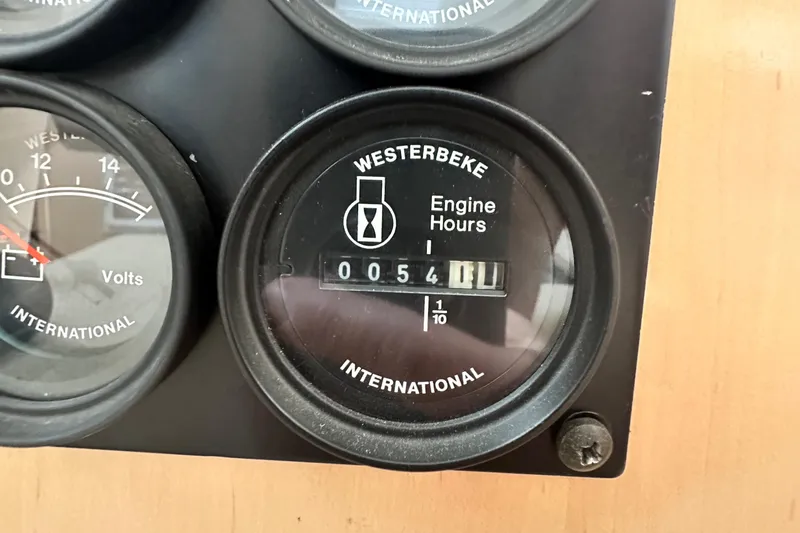 Slide: The Image of Westerbeke engine hour meter showing 54 hours on Carver 374 Voyager, 2000 model. - 45