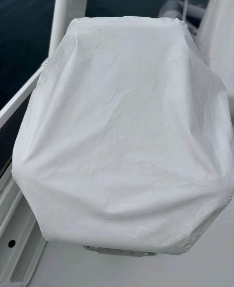 Slide: The Image of White cover on Carver 374 Voyager boat component, 2000 model. - 22