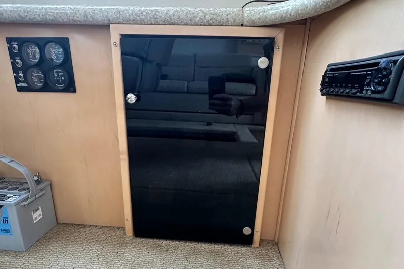 Slide: The Image of Control panel and stereo in 2000 Carver 374 Voyager yacht interior. - 42