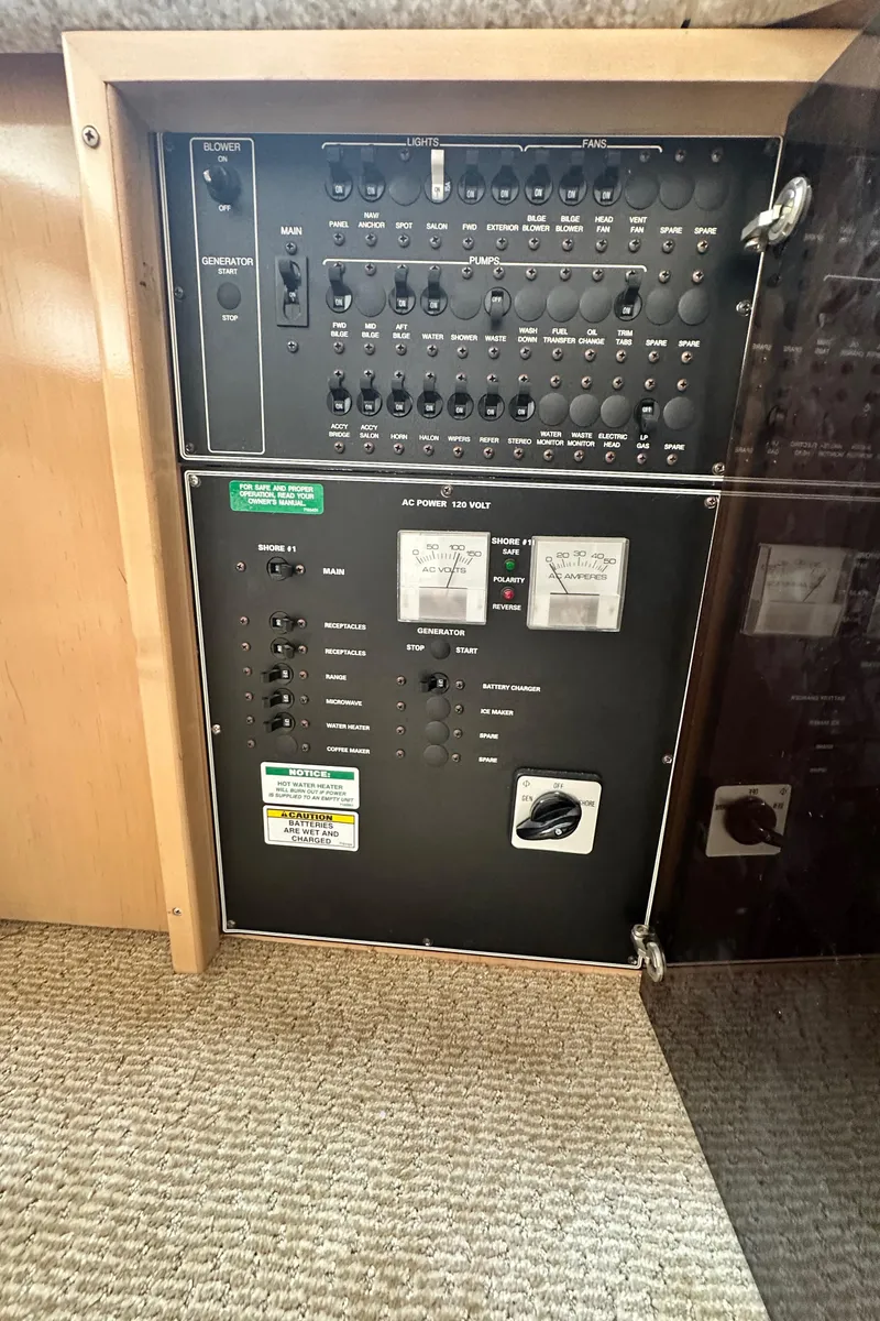 Slide: The Image of Electrical control panel on a 2000 Carver 374 Voyager boat. - 43