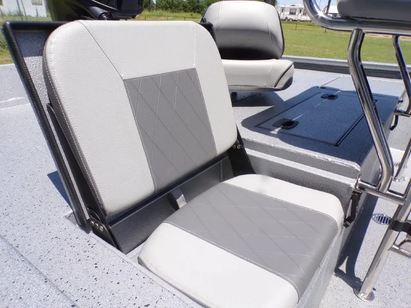 Slide: The Image of 2026 Xpress SW20BAY boat seat with gray and white upholstery, featuring diamond stitching. - 18