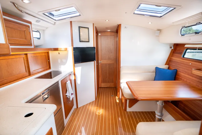Slide: The Image of Interior of 2017 MJM 40z Downeast yacht with wood finishes and modern amenities. - 8