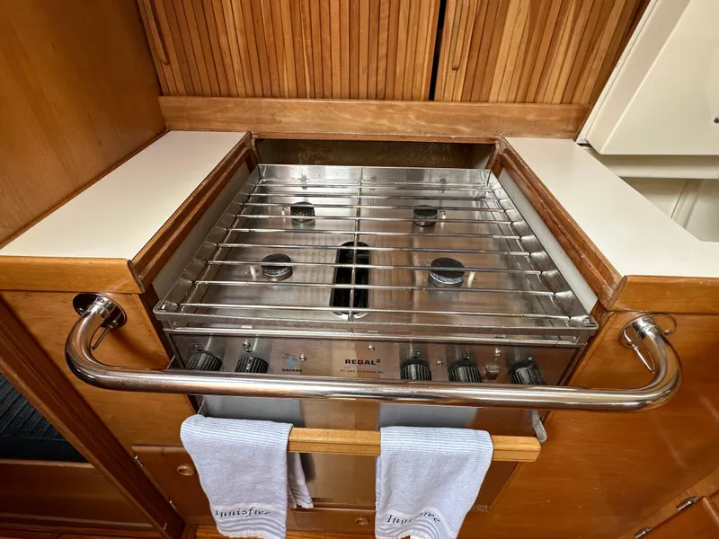 Slide: The Image of Stainless steel stove in a 1994 Sabre SABRE 425 yacht kitchen. - 19