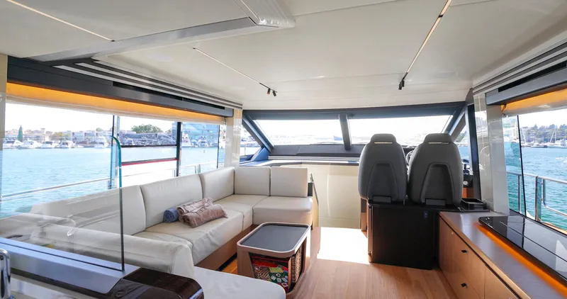 Slide: The Image of Luxurious interior of 2024 Absolute 60 Fly Co Ownership yacht with panoramic windows. - 26