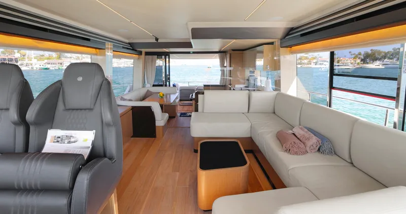 Slide: The Image of Luxurious interior of 2024 Absolute 60 Fly Co Ownership yacht with modern seating and panoramic views. - 29