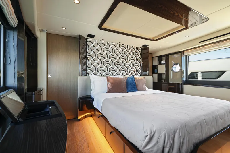 Slide: The Image of Luxurious bedroom interior of 2024 Absolute 60 Fly Co Ownership yacht, featuring modern design and elegant decor. - 32