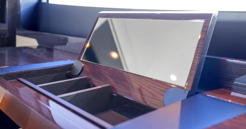 Slide: The Image of 2024 Absolute 60 Fly Co Ownership yacht interior with sleek wooden finish and modern design. - 36