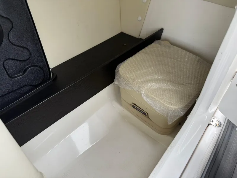 Slide: The Image of Interior storage compartment of 2016 Yamaha Boats 242 Limited S E-Series. - 36