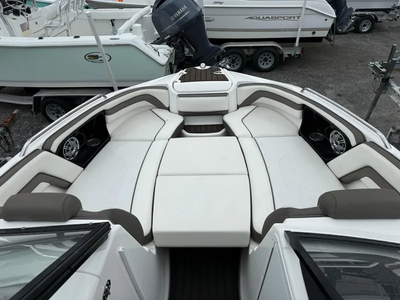 Slide: The Image of 2016 Yamaha Boats 242 Limited S E-Series interior with spacious seating and modern design. - 38