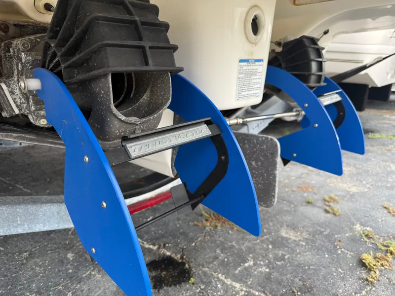 Slide: The Image of Close-up of Yamaha 242 Limited S E-Series 2016 boat jet nozzles with blue fins. - 8