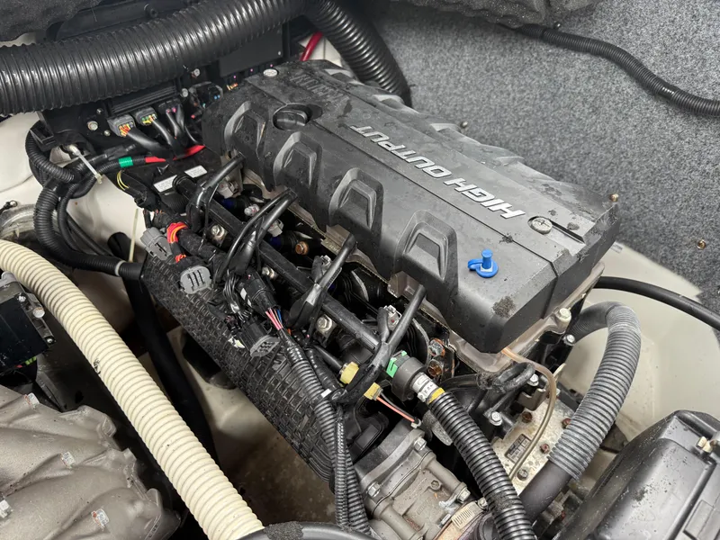Slide: The Image of Engine of 2016 Yamaha Boats 242 Limited S E-Series, showcasing intricate components and wiring. - 23
