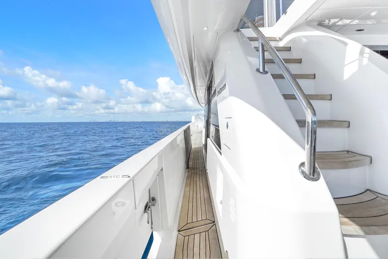 Slide: The Image of Side deck of 2019 Hatteras M90 Panacera yacht with ocean view. - 13