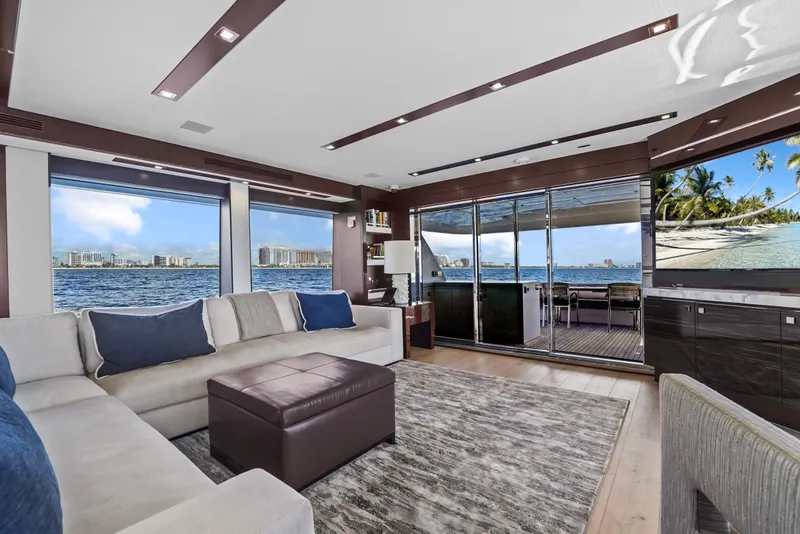 Slide: The Image of Luxurious interior of 2019 Hatteras M90 Panacera yacht with ocean view and modern decor. - 19
