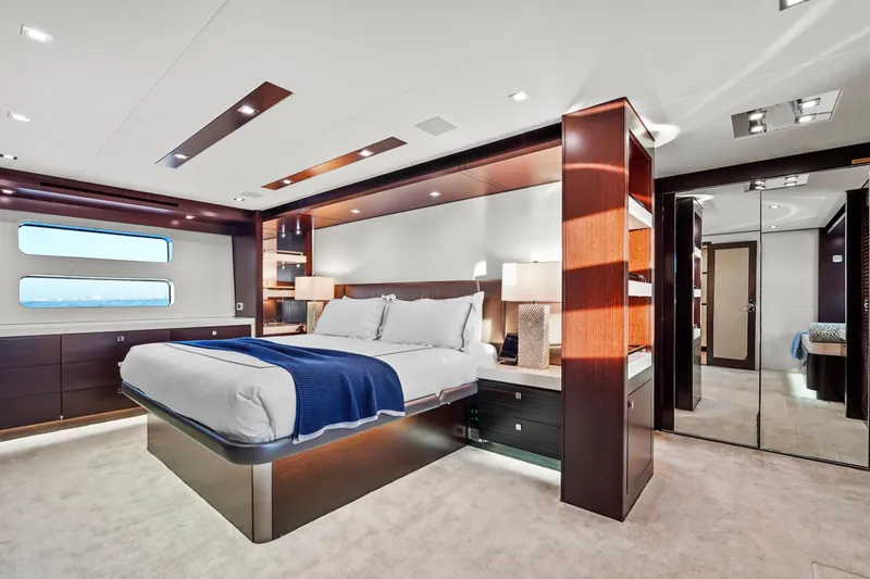 Slide: The Image of Luxurious bedroom interior of 2019 Hatteras M90 Panacera yacht with modern design and elegant furnishings. - 26