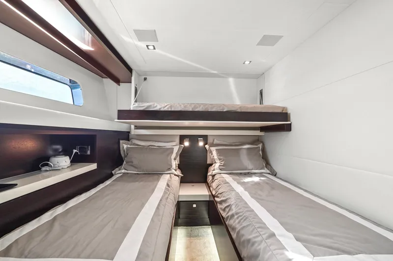 Slide: The Image of Luxurious cabin interior of 2019 Hatteras M90 Panacera yacht with twin beds and modern design. - 37