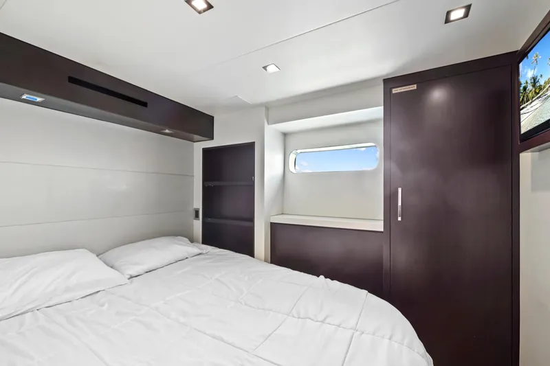 Slide: The Image of Luxurious bedroom interior of 2019 Hatteras M90 Panacera yacht with modern design elements. - 41