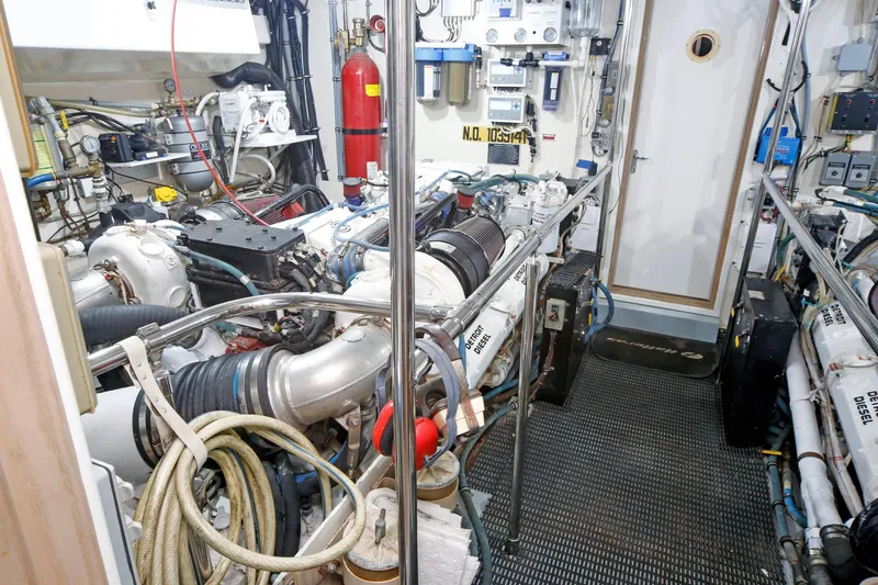 Slide: The Image of Engine room of 1995 Hatteras 74 Cockpit Motor Yacht with Detroit Diesel engines. - 29
