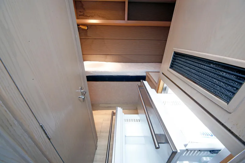 Slide: The Image of Interior of 1995 Hatteras 74 Cockpit Motor Yacht with open refrigerator drawers. - 40