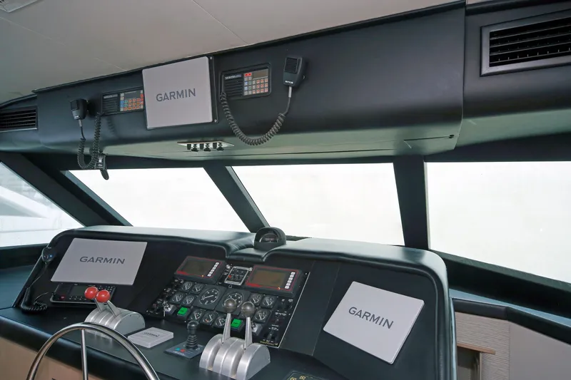 Slide: The Image of Cockpit of 1995 Hatteras 74 Cockpit Motor Yacht with Garmin navigation systems. - 60