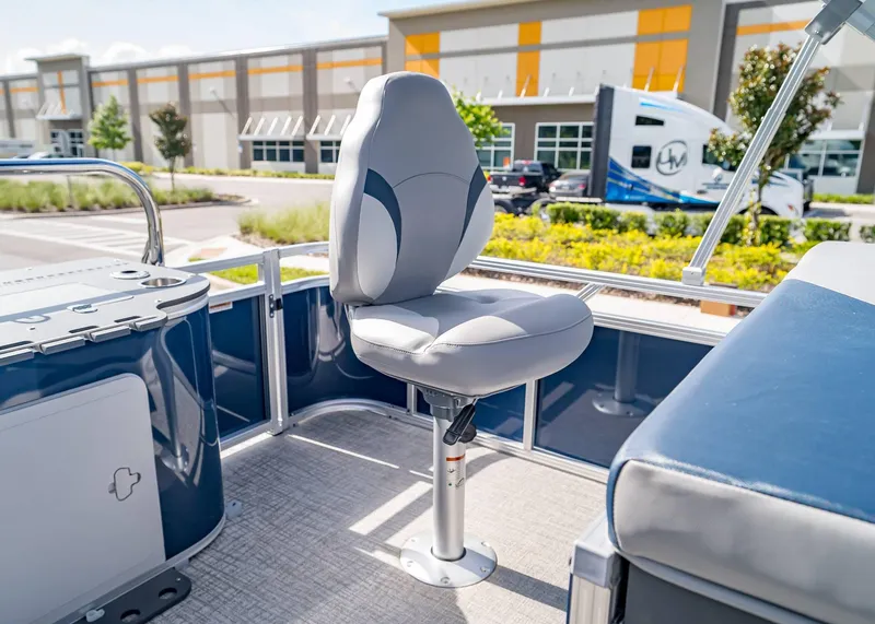 Slide: The Image of 2025 Tahoe SPORTS 85 REAR FISH boat seat, modern design, outdoor setting. - 17