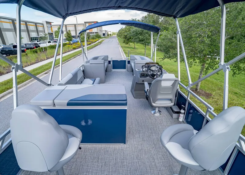 Slide: The Image of 2025 Tahoe SPORTS 85 REAR FISH pontoon boat with spacious seating and modern design. - 21
