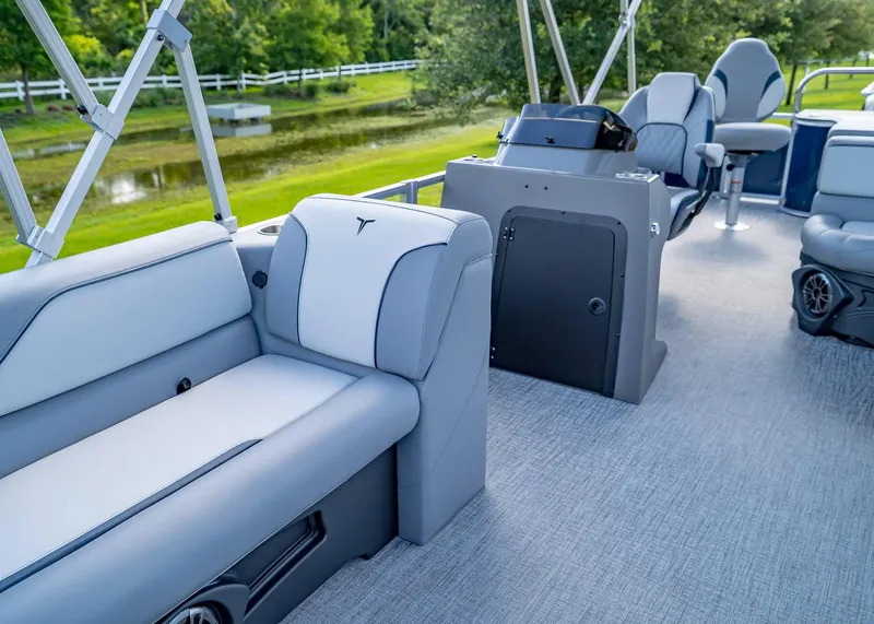 Slide: The Image of 2025 Tahoe SPORTS 85 REAR FISH boat interior with seating and control console. - 29