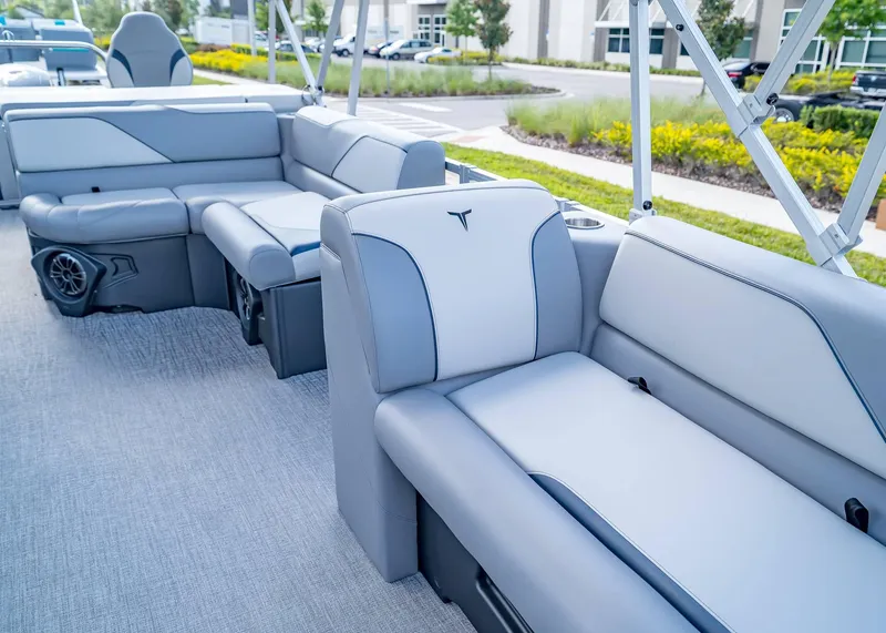 Slide: The Image of 2025 Tahoe SPORTS 85 REAR FISH boat interior with plush seating and modern design. - 30